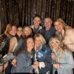 Pellucid Travel's team in the photo booth at the Best Buddies gala.